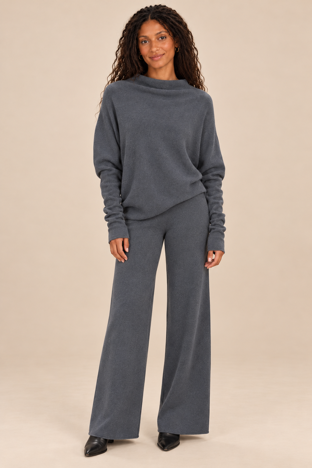 Cassie Charcoal high-drape styling with natural expression