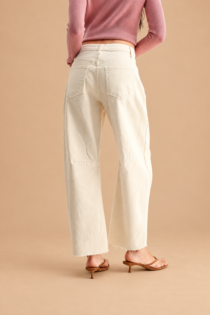 Barrel Jean — Almond, back view on tan background