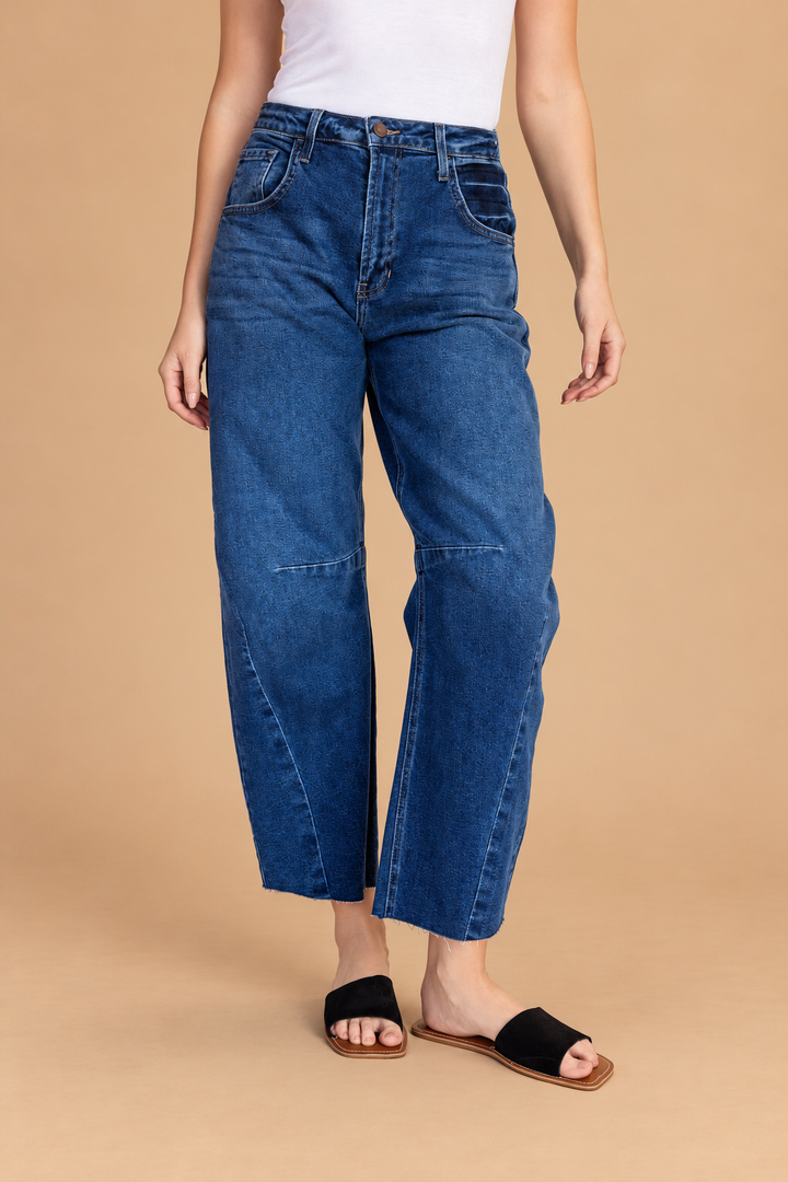 Barrel Jean — Dark Denim, front view on tan background