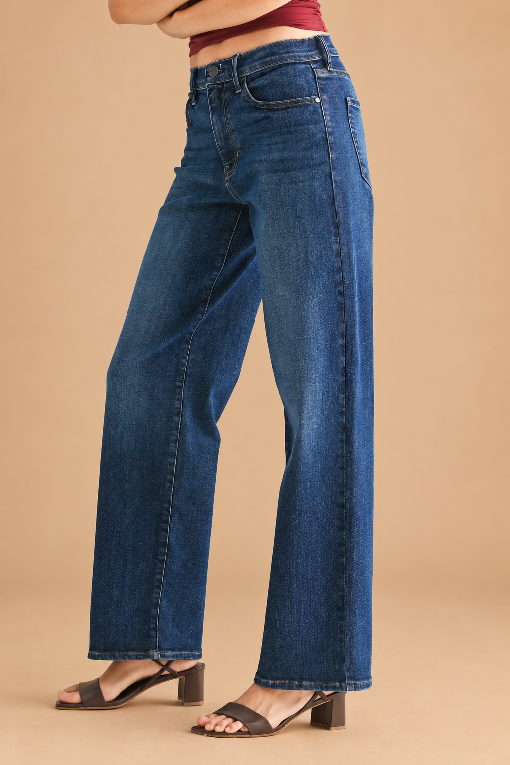 Loose Straight Jean — Dark Wash, side view on tan background