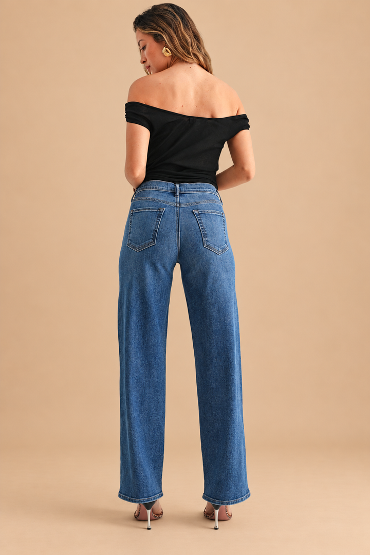 Loose Straight Jean — Medium Wash, back view on tan background