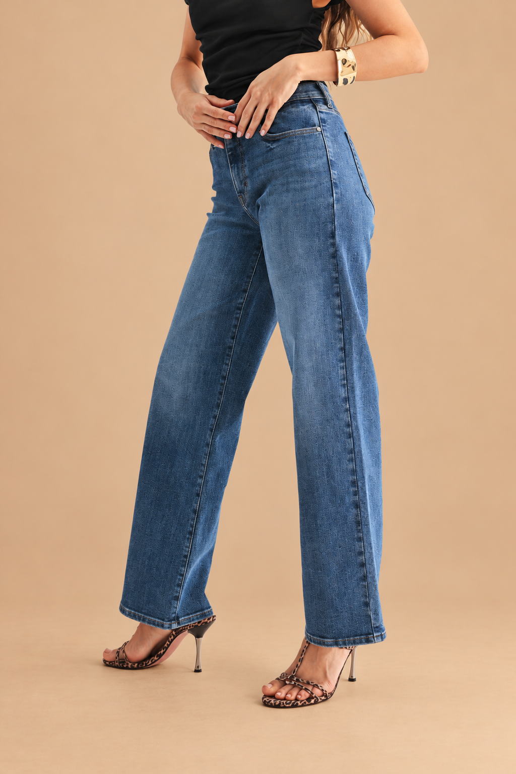 Loose Straight Jean — Medium Wash, side view on tan background