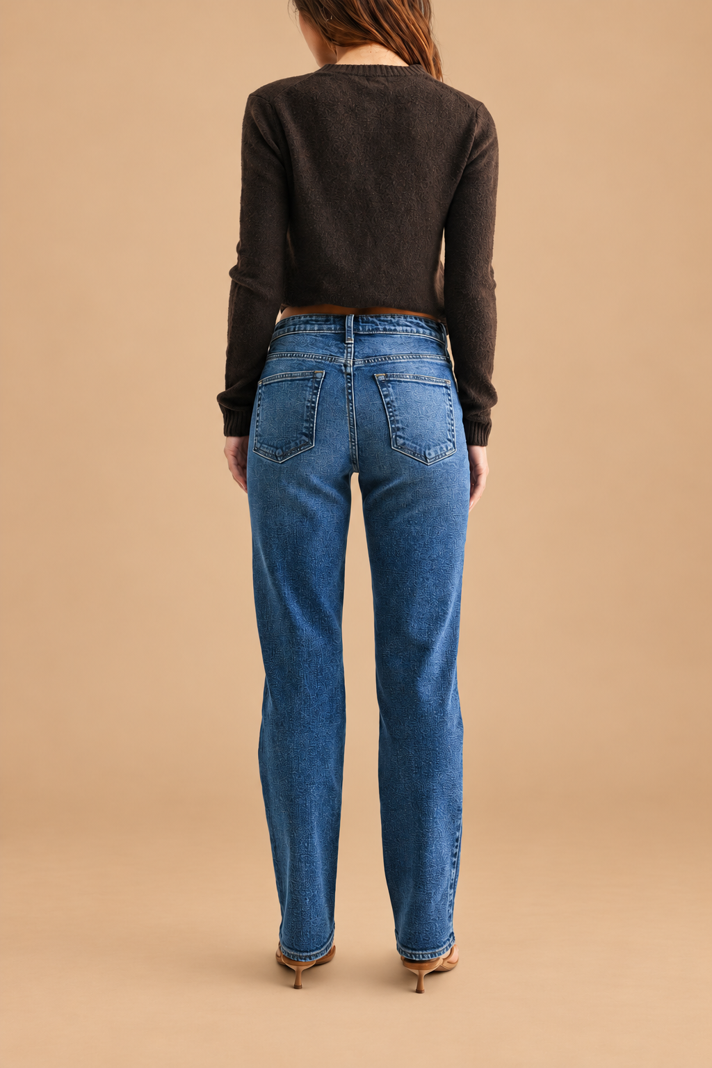 Mid Rise Stovepipe Straight Leg Jean — Dark Denim, back view on tan background