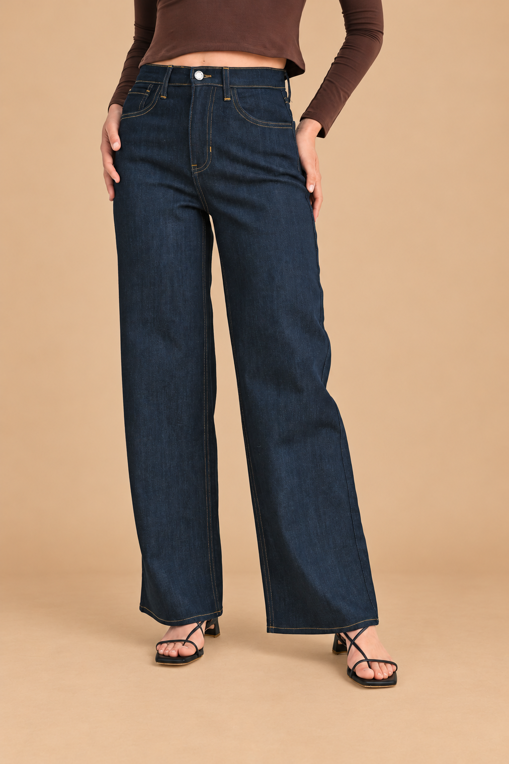 Relaxed Wide Straight Jean — Dark Denim, front view on tan background