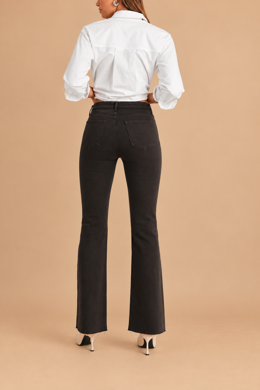 Scissor Cut Flare Jean — Dark Chocolate, back view on tan background