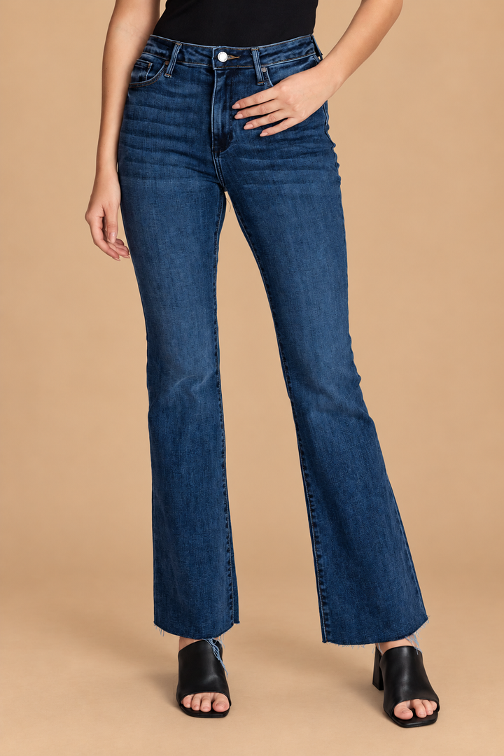 Scissor Cut Flare Jean — Dark Wash, front view on tan background