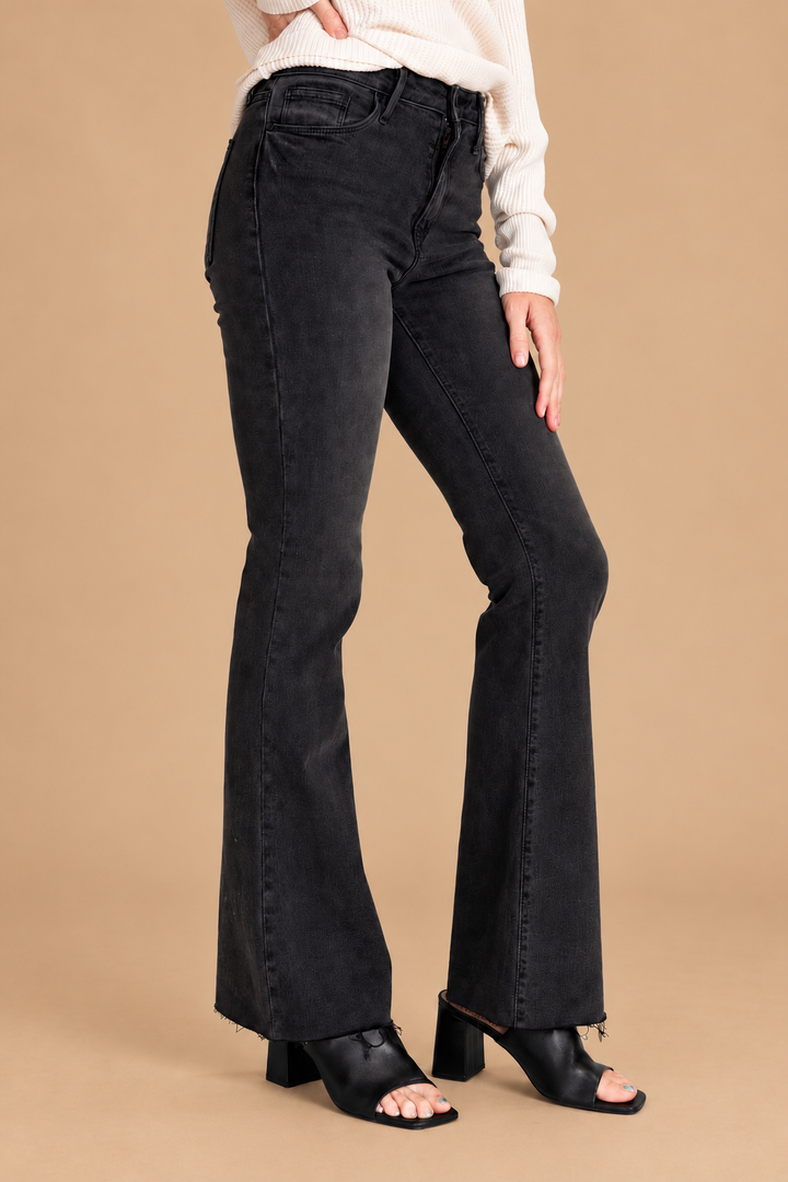 Scissor Cut Flare Jean — Washed Black, front view on tan background