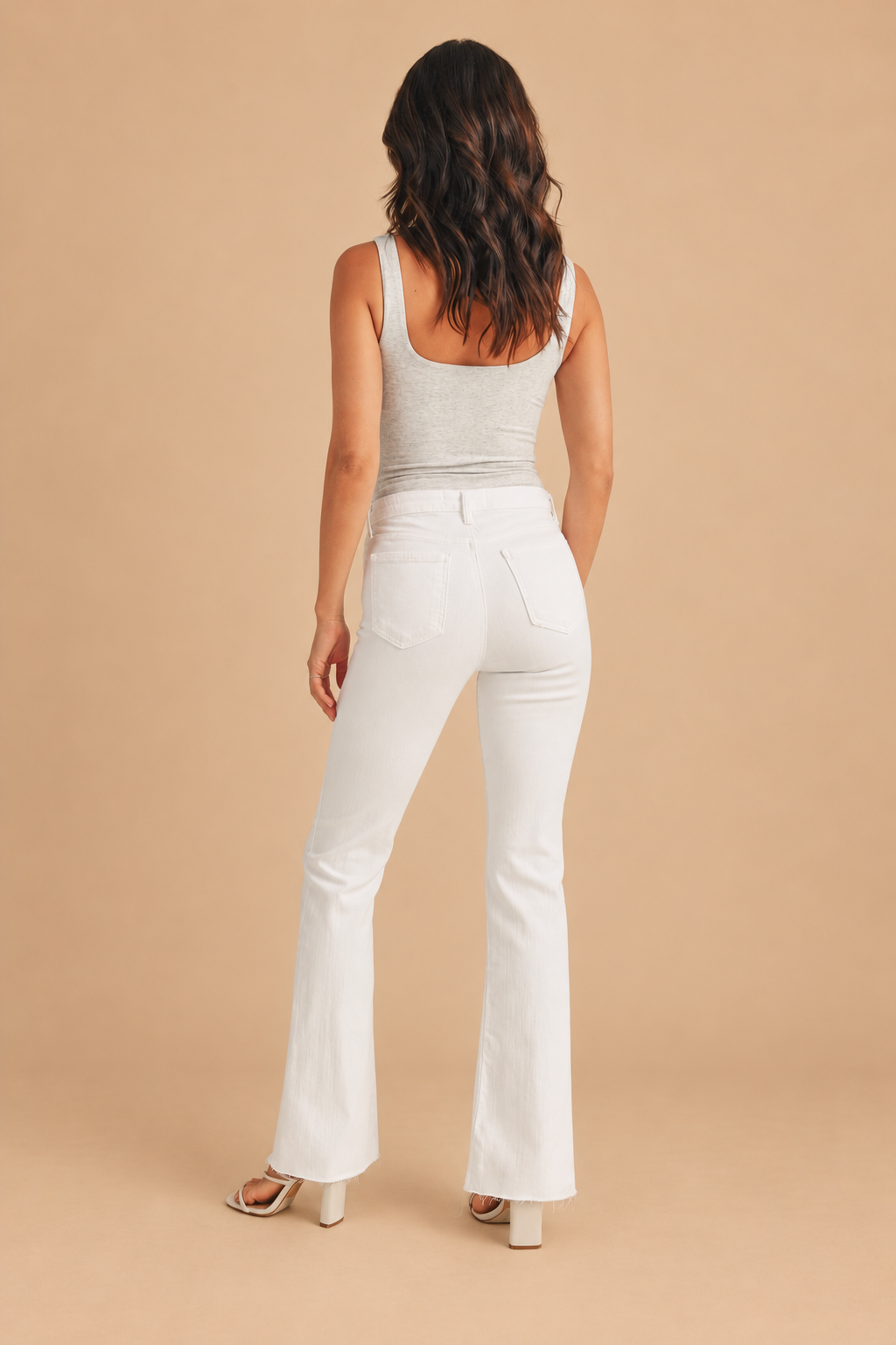 Scissor Cut Flare Jean — Optic White, back view on tan background