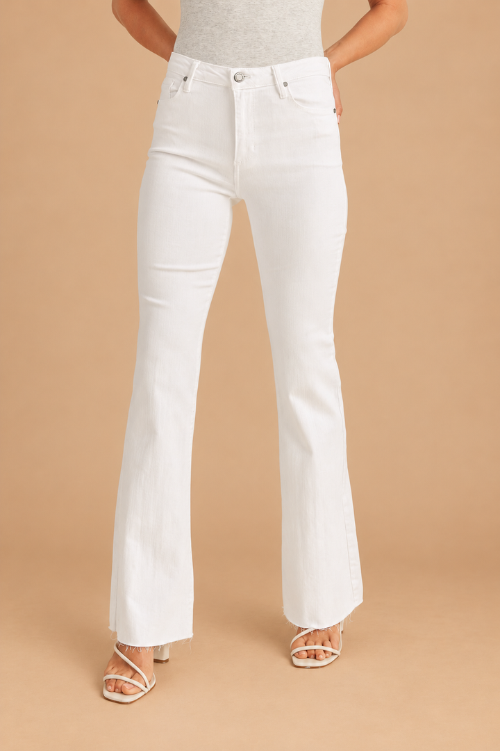Scissor Cut Flare Jean — Optic White, front view on tan background