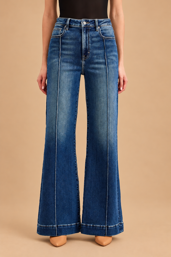 Ann Pintuck Flare Jean — Dark, front view on tan background