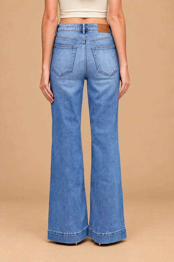 Ann Pintuck Flare Jean — Medium, back view on tan background