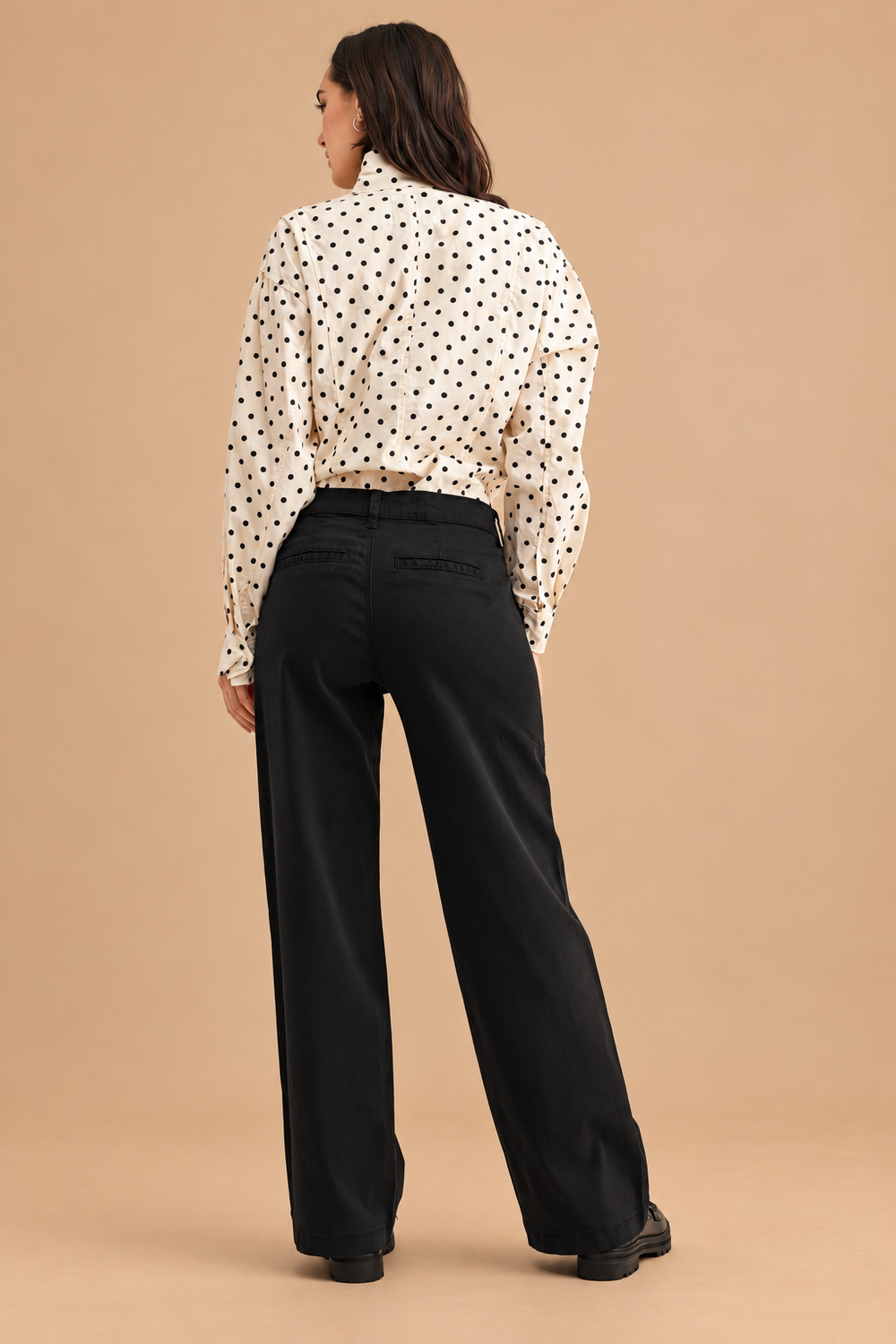 Stretch Twill Straight Leg Pant — Black, back view on tan background