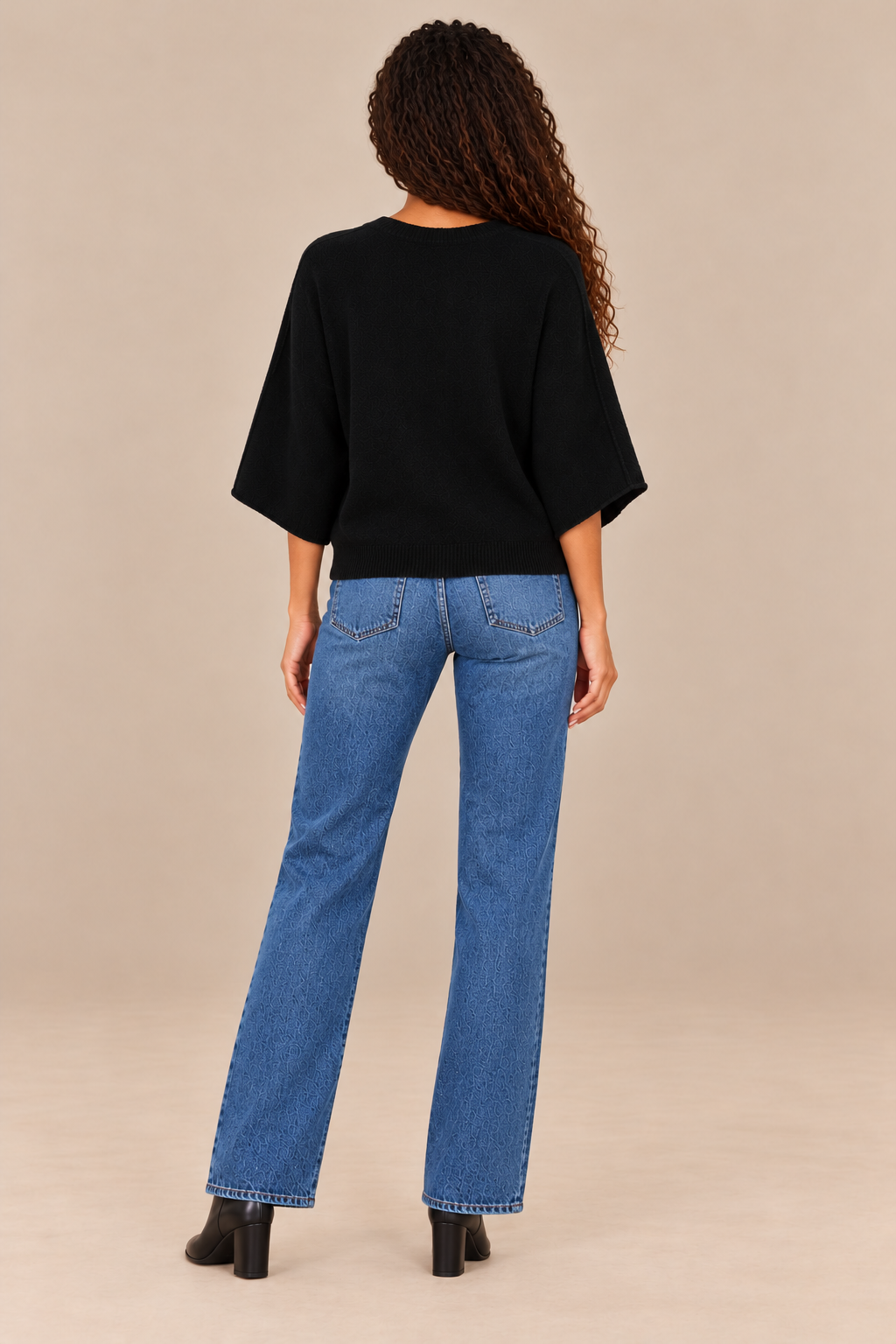 Christine Crewneck Sweater Black back on holiday campaign model