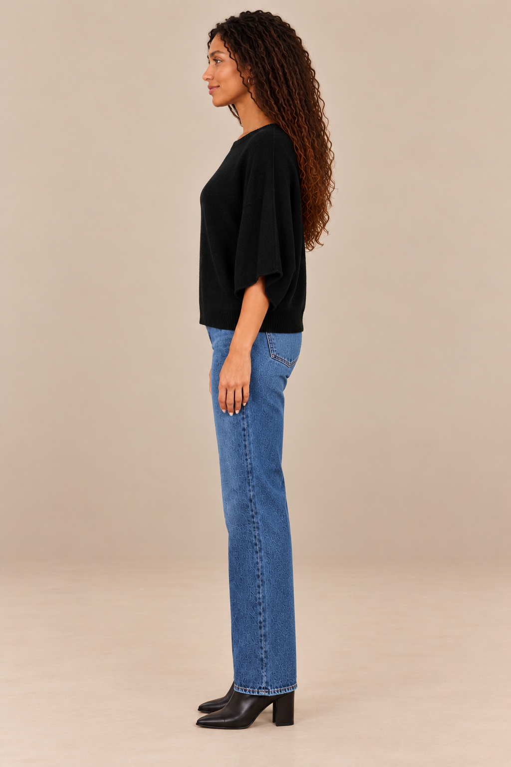 Christine Crewneck Sweater Black side on holiday campaign model