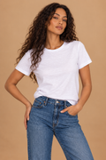 Modern Tee White front on curly-haired campaign model with blue jeans