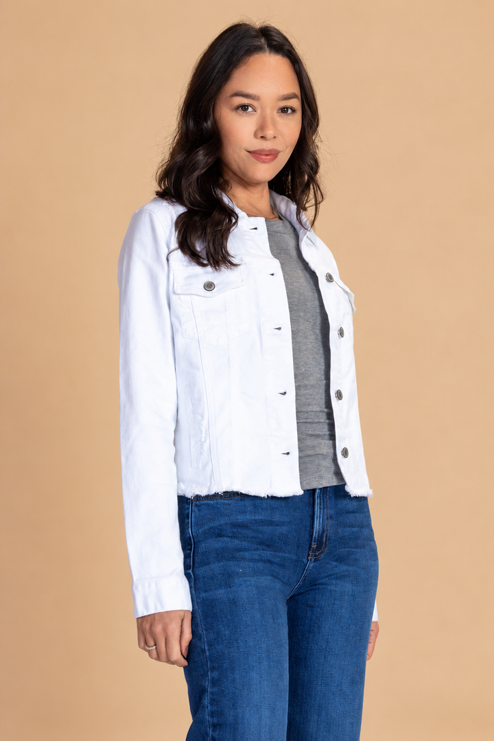 Distressed Jean Jacket — White, white angled view on tan background