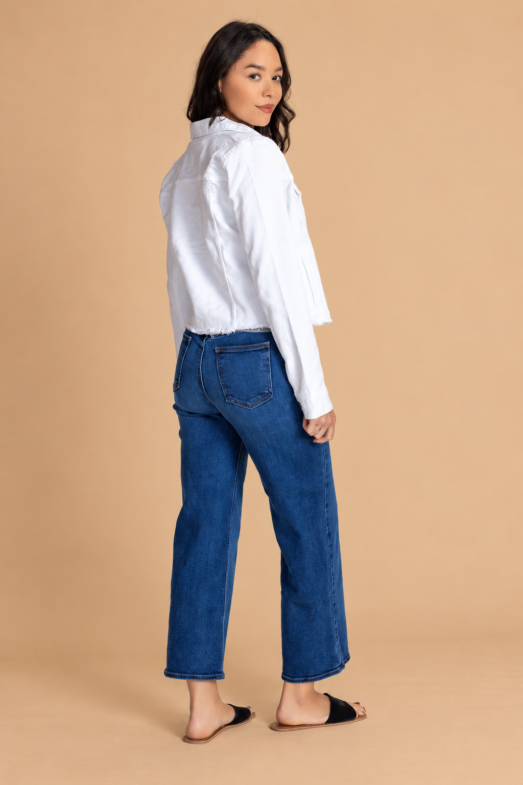 Distressed Jean Jacket — White, white back view on tan background