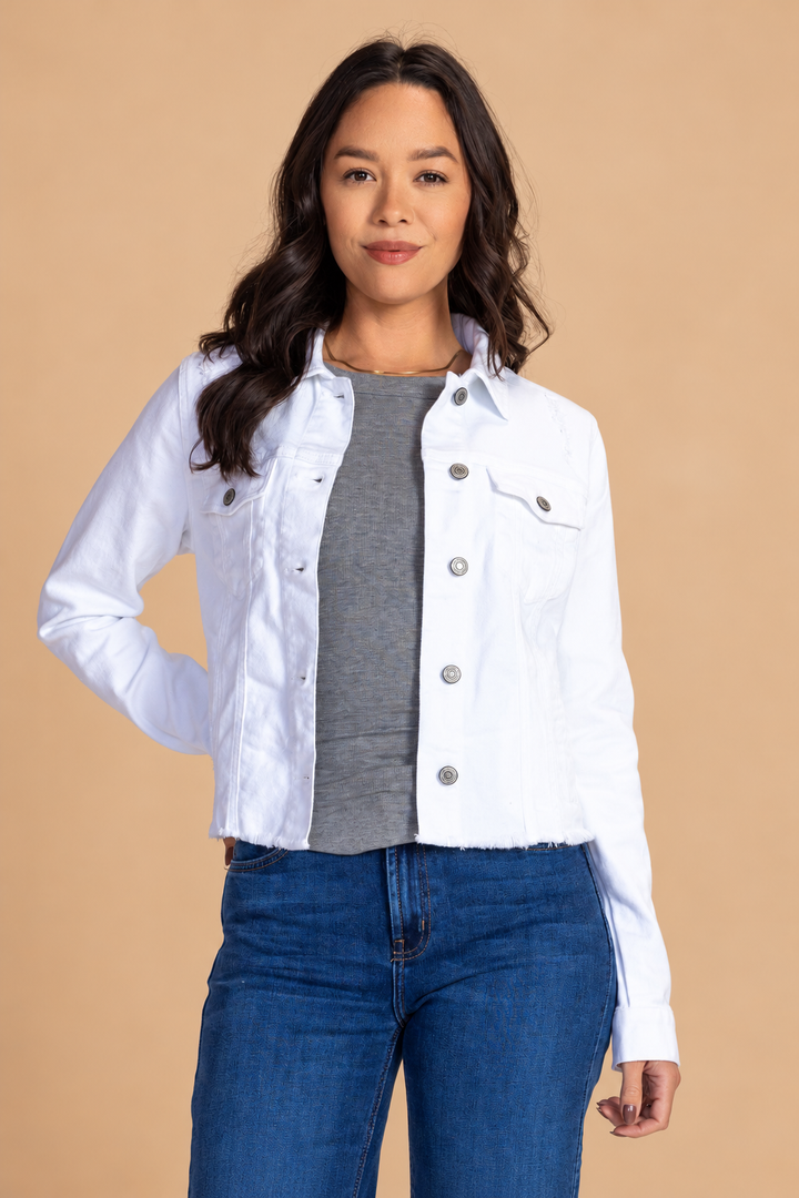 Distressed Jean Jacket — White, white front view on tan background